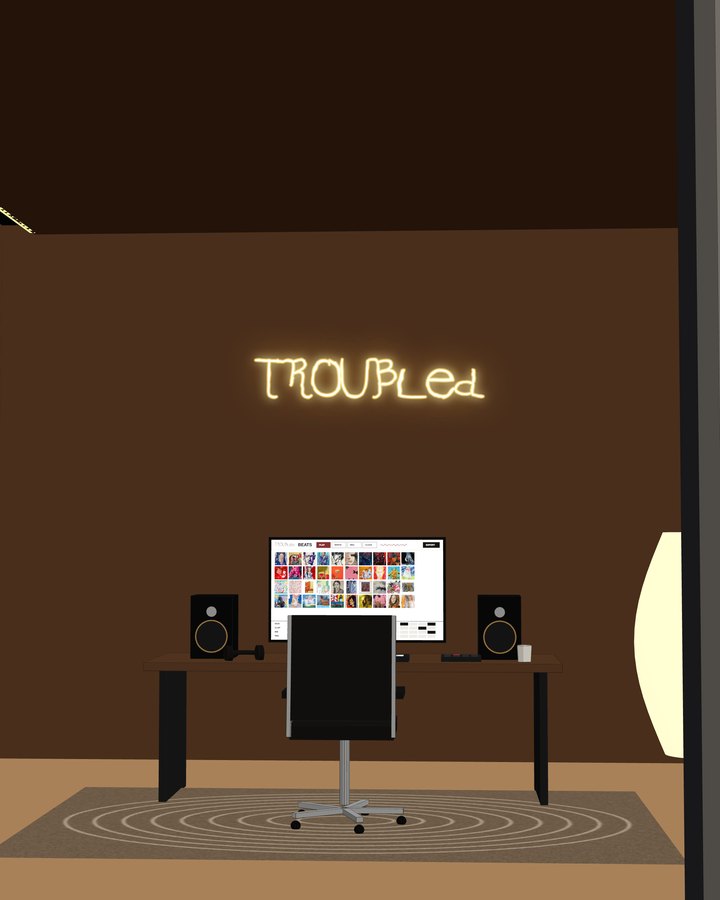 The studio: the TROUBled sign over the desk